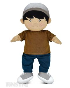 Apple Park's organic boy toddler doll, Grady, wears a brown shirt, blue pants, grey and white joggers and a grey cap and features beautifully embroidered eyes, nose, and mouth and hand-painted rosy cheeks.