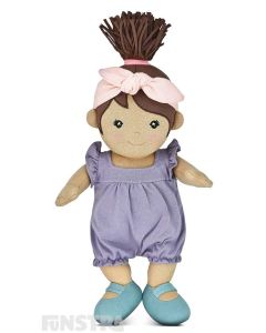 Apple Park's organic girl toddler doll, Paloma, wears a purple romper, green shoes, a pink headband and features beautifully embroidered eyes, nose, and mouth and hand-painted rosy cheeks.