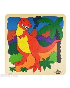 Vibrant and colourfully painted wooden jigsaw puzzle pieces create the fearsome Tyrannosaurus Rex standing in a prehistoric scene from the Jurassic world surrounded by palm trees and erupting volcano on this tiling puzzle.