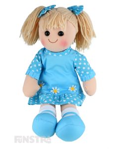 Agnes is an sweet doll with a soft cloth body and blonde hair tied in pigtails with polka dot bows and wears a matching polka dot dress  embellished with appliqué daisies.