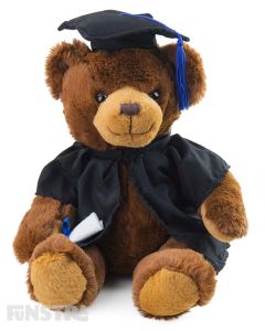 Johnny bear is all smiles holding the certificate for his diploma. Dressed in a black graduation robe with grad hat complete with blue tassels, Johnny is the perfect cuddly brown graduation bear to offer congrats to graduates.