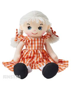 Charlotte is a charming rag doll with a soft cloth body and light blonde hair plaited in pigtails and wears a sweet orange gingham dress with black mary jane shoes and loves going to the market and having picnics.