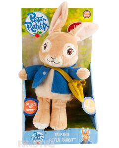 Peter Rabbit says, 'Yummy, scrummy radishes, here we come!', 'A good rabbit never gives up!', 'And all rabbits need a little help from their friends!', 'Let's hop to it!' and giggles.