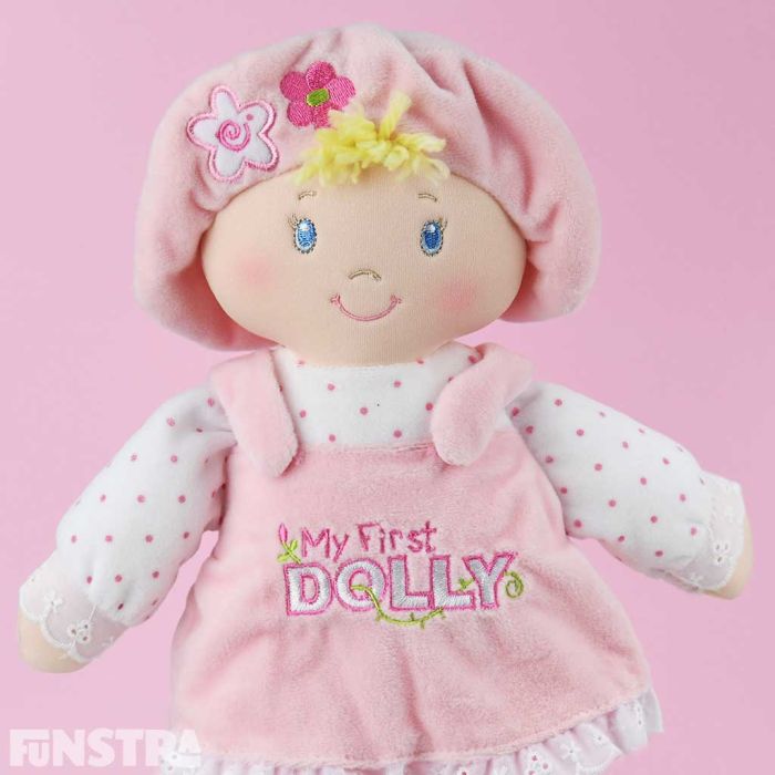 Baby's first dolly is dressed in pink and makes a wonderful gift for a newborn baby girl.