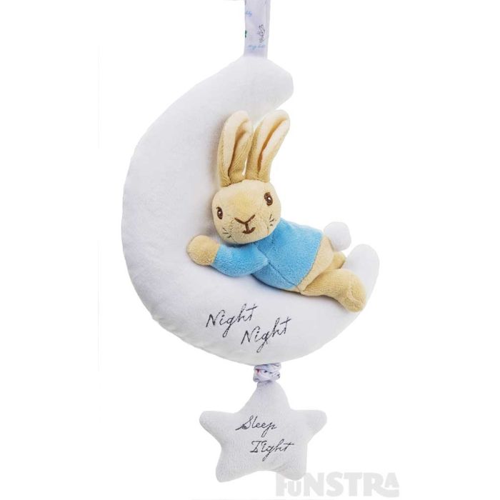Peter Rabbit cuddles a moon. Pull down on the star to hear lullaby music.