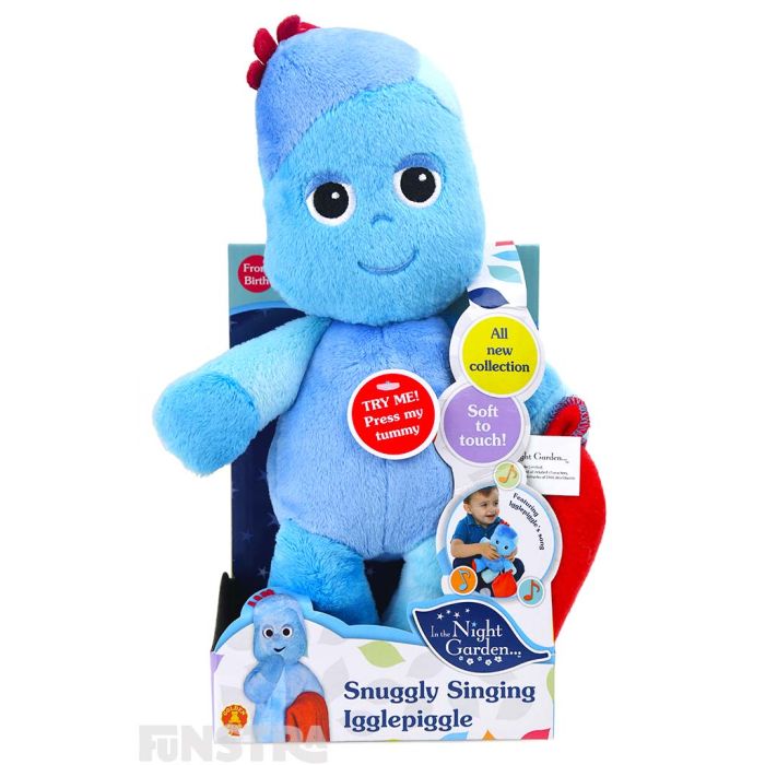 Snuggle and cuddle with talking Igglepiggle blue teddy doll, holding his red blanket.