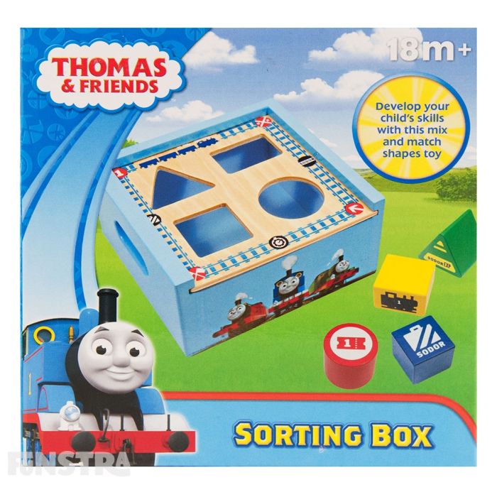Learn colors and shapes with the Thomas the Tank Engine wooden shape sorting toy box featuring red, blue, green and yellow building blocks in the shape of a circle, square, triangle and rectangle.