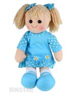 Agnes is an sweet doll with a soft cloth body and blonde hair tied in pigtails with polka dot bows and wears a matching polka dot dress  embellished with appliqué daisies.