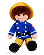 Ted is a firefighter doll with a soft cloth body and red-brown hair and wears yellow trousers, blue jacket and a yellow hat.