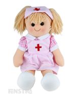 Thelma is an sweet and caring doll with a soft cloth body and blonde hair in pigtails and wears a pink nurse's uniform and nurse's hat.